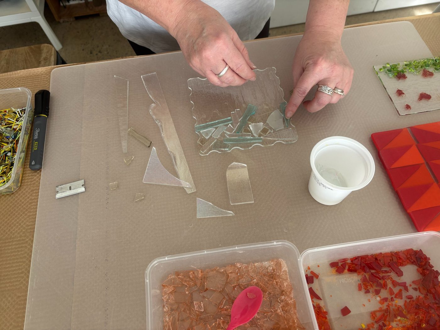 Guests cutting glass