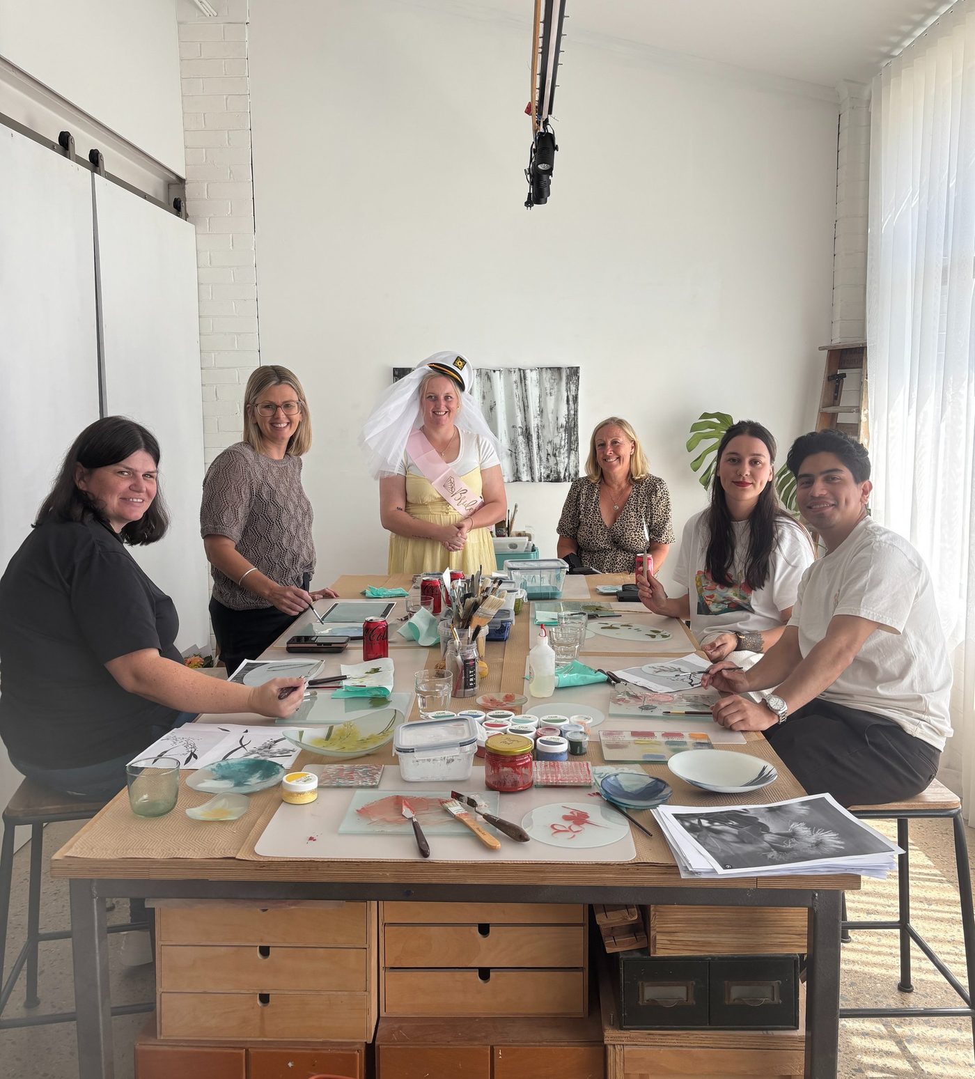 A hens group at the studio table