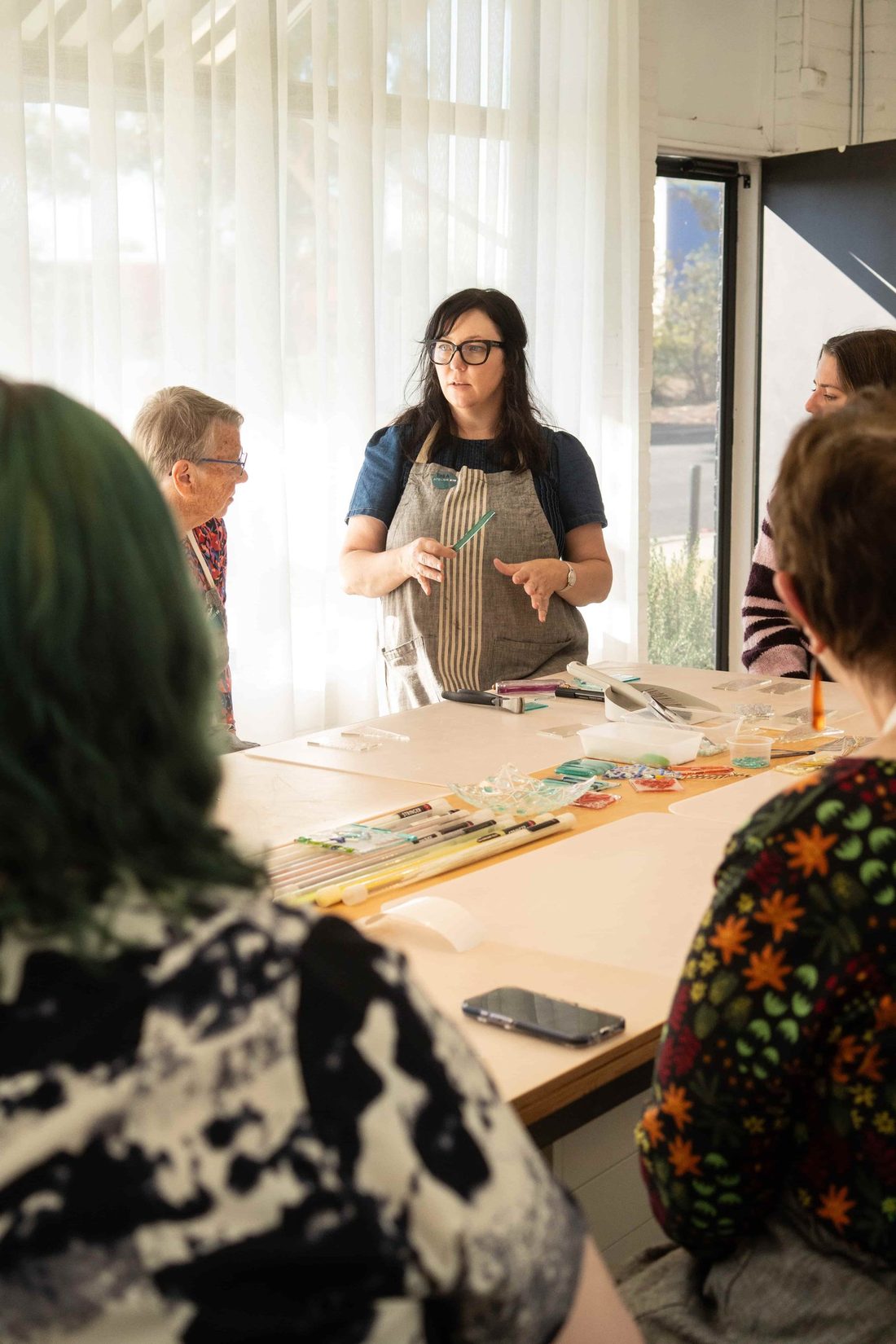 Lisa Cahill teaching a glass class